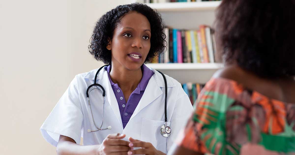 female doctor explaining seizure rescue therapies to patient